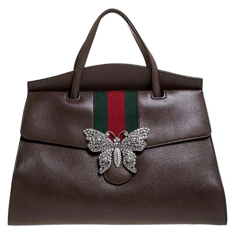 gucci butterfly bag gold|Gucci bags under 500.